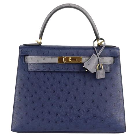 Precioso bolso Hermès Kelly 28 sellier en piel de avestruz